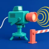 Турквізовий проектор на штативі світить жовтими концентричними колами